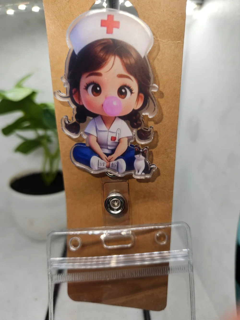 Nurse Blowing A Bubble ID Retractable Reel